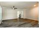 Spacious living room featuring luxury vinyl flooring, neutral paint and lots of light at 114 Seastone St, Raleigh, NC 27603