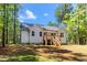 Backyard of the house showing the back porch and stairs at 121 Quarterhorse Dr, Louisburg, NC 27549