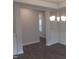 Dining room with wainscoting and dark hardwood floors at 15 Decatur Dr, Fuquay Varina, NC 27526