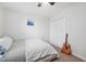 Neutral bedroom with large closet, ceiling fan and carpeted floor at 1851 Trailwood Heights Ln # 201, Raleigh, NC 27603