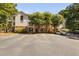 Apartment building with well maintained parking lot and landscaped grounds at 1851 Trailwood Heights Ln # 201, Raleigh, NC 27603