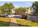 Well-maintained parking lot with green space in front of condo complex at 1851 Trailwood Heights Ln # 201, Raleigh, NC 27603