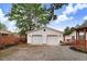 Detached two-car garage with ample parking space and well-maintained exterior and a gazebo at 201 Shady Lane Dr, Smithfield, NC 27577