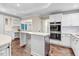 Modern kitchen featuring sleek appliances and hardwood floors at 201 Shady Lane Dr, Smithfield, NC 27577