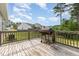 Spacious back deck with a wooden grill and scenic views of the backyard at 2040 Alderman Way, Creedmoor, NC 27522