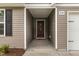 Exterior of the front door to a well maintained home at 2040 Alderman Way, Creedmoor, NC 27522