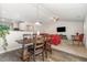 Open-concept layout connecting the dining room, living room, and kitchen creates a spacious atmosphere at 2040 Alderman Way, Creedmoor, NC 27522