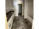 Bathroom featuring granite countertops, double sinks, and a shower-tub combo at 207 S Main St # A, Four Oaks, NC 27524