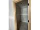 A raw, unfinished walk-in closet featuring a light fixture and potential for custom organization at 207 S Main St # A, Four Oaks, NC 27524