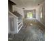 Spacious new living room with rear patio access; ready for your personal touch at 207 S Main St # A, Four Oaks, NC 27524