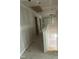 Bright hallway with multiple doors, promising easy navigation and access to various rooms at 207 S Main St # B, Four Oaks, NC 27524