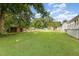 Spacious backyard with shed for storage, lush lawn, and mature trees at 2129 Wrenn St, Burlington, NC 27215