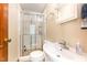 Bathroom featuring a glass-enclosed shower, a sink with vanity, and neutral-toned walls at 2129 Wrenn St, Burlington, NC 27215