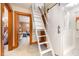 Hallway with view of bathroom and bedroom plus an access ladder to a loft at 2129 Wrenn St, Burlington, NC 27215