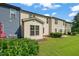 Well-maintained backyard with lush greenery and patio furniture at 236 Lynchwick Ln, Durham, NC 27703