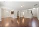 Spacious living room with beautiful hardwood floors and lots of natural light at 236 Lynchwick Ln, Durham, NC 27703