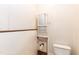 Bathroom with toilet, shelving and exposed plumbing at 310 Spring St, Durham, NC 27703