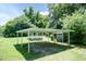 The home has covered parking, a shed, and a gazebo at 310 Spring St, Durham, NC 27703