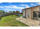 Backyard with playset, grass, a concrete patio, and a basketball hoop at 3106 Royal Deeside Ct, Zebulon, NC 27597