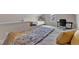 Bedroom featuring two beds, a desk, and a window for natural light at 3106 Royal Deeside Ct, Zebulon, NC 27597