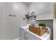 Laundry room featuring a washer and dryer set, along with shelving for storage at 3106 Royal Deeside Ct, Zebulon, NC 27597