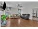 Spacious living room with hardwood floors, providing ample seating and natural light at 3106 Royal Deeside Ct, Zebulon, NC 27597