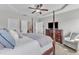 Spacious main bedroom featuring a tray ceiling, furniture set, and ample storage at 3106 Royal Deeside Ct, Zebulon, NC 27597