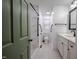 Modern bathroom with a walk-in shower and updated vanity at 3129 Barwell Rd, Raleigh, NC 27610