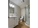 Bathroom featuring a shower, modern vanity, and contemporary design elements at 3212 Potthast Ct, Raleigh, NC 27529