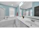 Bright bathroom with dual sinks, soaking tub and walk-in shower at 322 Tobacco Farm Way, Chapel Hill, NC 27516
