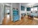 Dining room showcasing hardwood floors, decorative hutch, and ample natural light at 322 Tobacco Farm Way, Chapel Hill, NC 27516