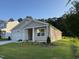 Charming single-Gathering home with a two-car garage and well-manicured lawn at 3428 Pinnacle Peak Dr, Raleigh, NC 27604
