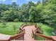 Multi-level deck perfect for entertaining with a beautiful view of the expansive landscaped backyard at 3581 Boulder Ct, Wake Forest, NC 27587