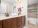 Bathroom featuring a dual vanity with granite countertop and tile flooring at 3581 Boulder Ct, Wake Forest, NC 27587