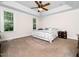 Bedroom with neutral color scheme, multiple windows, and soft carpet at 3581 Boulder Ct, Wake Forest, NC 27587