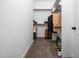 Walk-in closet featuring carpet, shelving, and hanging clothes at 3581 Boulder Ct, Wake Forest, NC 27587