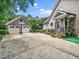 View of the home's exterior with a driveway, two-car garage, and manicured landscaping at 3581 Boulder Ct, Wake Forest, NC 27587