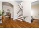 Entryway with hardwood floors and staircase, leading to other living spaces at 3581 Boulder Ct, Wake Forest, NC 27587