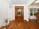 Elegant foyer with hardwood floors, a wooden front door, and views to adjacent rooms at 3581 Boulder Ct, Wake Forest, NC 27587