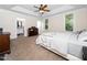 Spacious bedroom features tray ceiling, fan, walk-in closet, and multiple windows at 3581 Boulder Ct, Wake Forest, NC 27587