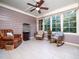 This sunroom is filled with natural light and has tile floors at 3581 Boulder Ct, Wake Forest, NC 27587