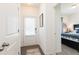 Bright foyer leading to a bedroom with a view of a beautifully made bed at 367 Deodora Lane Ln, Cameron, NC 28326