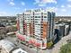 Aerial view of a high-rise building showing its architectural details and surrounding urban environment at 400 W North St # 900, Raleigh, NC 27603