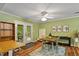The dining area with lots of natural light, seamlessly blends with the outdoor deck view at 4404 Oak Park Rd, Raleigh, NC 27612