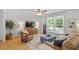 Cozy living room with natural light, comfortable seating, and a neutral color palette at 4404 Oak Park Rd, Raleigh, NC 27612