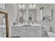 Bright bathroom with double vanity, ample counter space, and convenient storage cabinets at 48 Highview Ct, Fuquay Varina, NC 27526