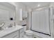 Bathroom with a single vanity, toilet, cabinet, and shower with curtain at 48 Highview Ct, Fuquay Varina, NC 27526