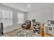 Comfortable office space featuring a brown recliner and a gray office chair at 48 Highview Ct, Fuquay Varina, NC 27526
