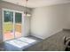 Bright dining area with sliding glass doors leading to a wooden deck; great for entertaining at 50 Teal Dr, Youngsville, NC 27596