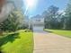 This beautiful home features a large driveway and 2-car garage at 50 Teal Dr, Youngsville, NC 27596